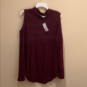 Burgundy/wine mock neck cold shoulders sweater.